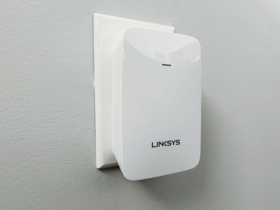 How do I Reconnect the Linksys Extender to My Home Network?